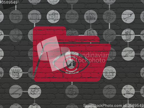Image of Business concept: Folder With Eye on wall background