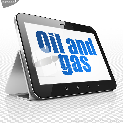 Image of Manufacuring concept: Tablet Computer with Oil and Gas on display