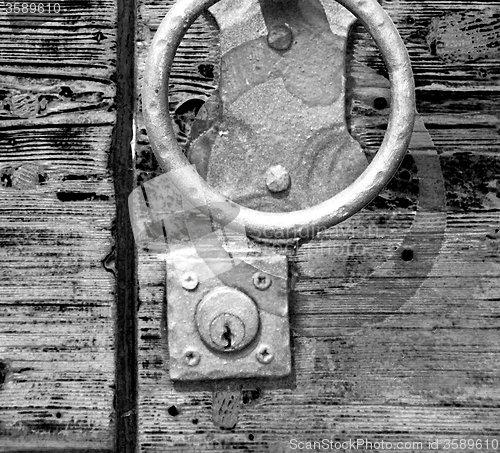 Image of europe old in  italy  antique close brown door and rusty lock  c