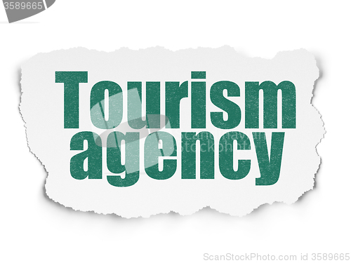 Image of Tourism concept: Tourism Agency on Torn Paper background