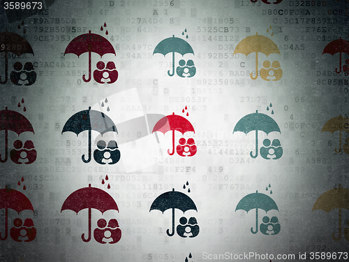 Image of Safety concept: Family And Umbrella icons on Digital Paper background