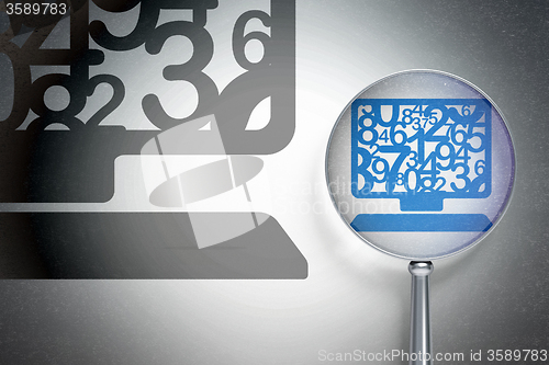 Image of Studying concept:  Computer Pc with optical glass on digital background