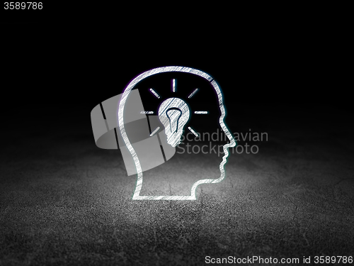 Image of Studying concept: Head With Lightbulb in grunge dark room