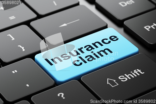 Image of Insurance concept: Insurance Claim on computer keyboard background