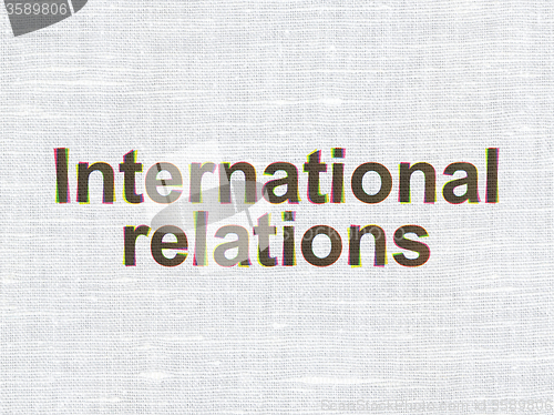 Image of Politics concept: International Relations on fabric texture background