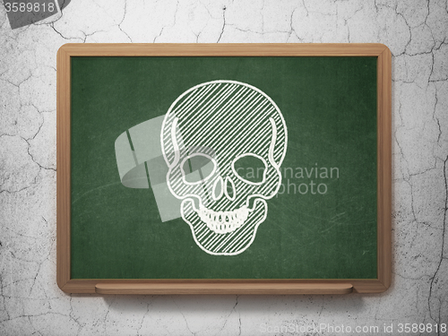 Image of Healthcare concept: Scull on chalkboard background