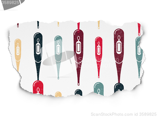 Image of Healthcare concept: Thermometer icons on Torn Paper background