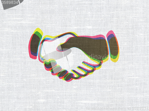 Image of Business concept: Handshake on fabric texture background