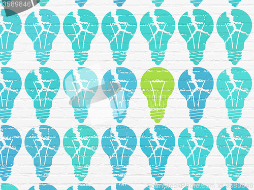 Image of Business concept: light bulb icon on wall background