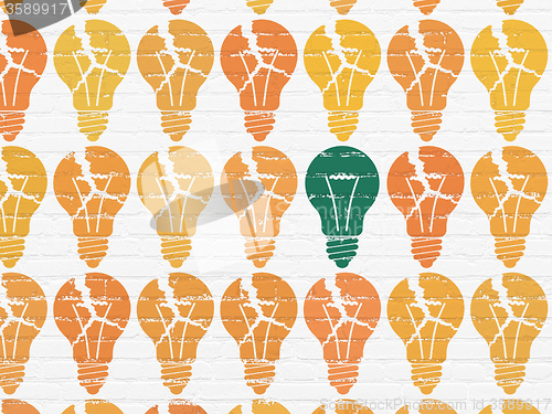 Image of Business concept: light bulb icon on wall background