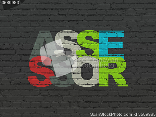 Image of Insurance concept: Assessor on wall background