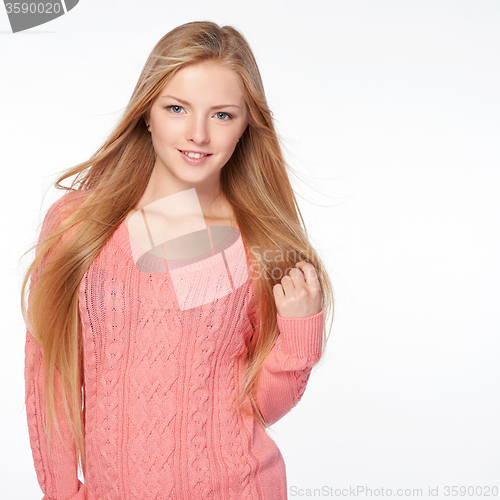 Image of Woman with hair lightly fluttering in the wind