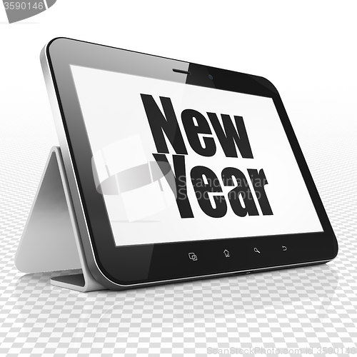 Image of Entertainment, concept: Tablet Computer with New Year on display