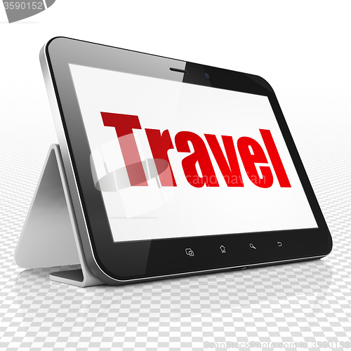 Image of Holiday concept: Tablet Computer with Travel on display
