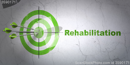 Image of Health concept: target and Rehabilitation on wall background