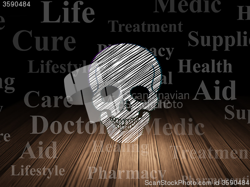 Image of Medicine concept: Scull in grunge dark room