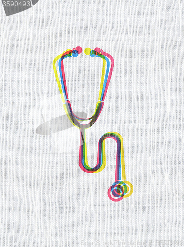 Image of Medicine concept: Stethoscope on fabric texture background