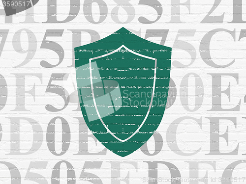 Image of Privacy concept: Shield on wall background