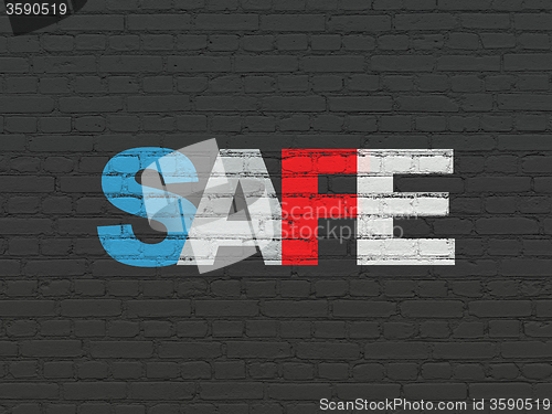 Image of Protection concept: Safe on wall background