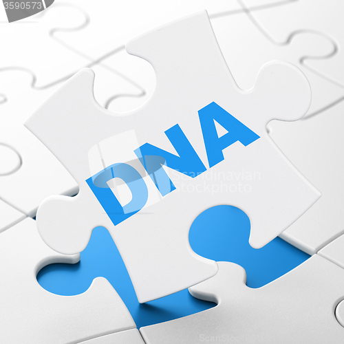 Image of Medicine concept: DNA on puzzle background