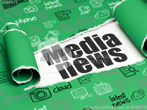 Image of News concept: black text Media News under the piece of  torn paper