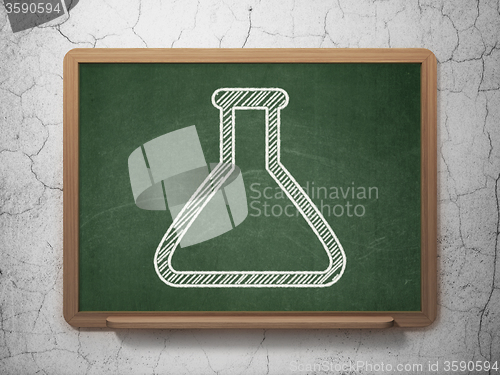 Image of Science concept: Flask on chalkboard background