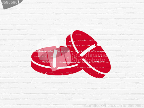 Image of Medicine concept: Pills on wall background