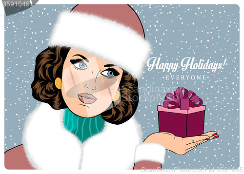 Image of Sexy, beautiful woman in the winter wishing \"Happy Holidays\"