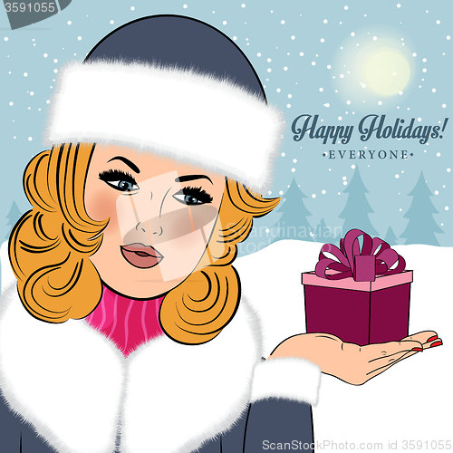 Image of Sexy, beautiful woman in the winter wishing \"Happy Holidays\"