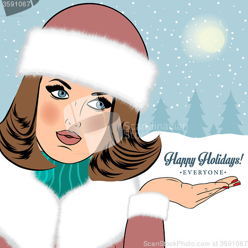 Image of Sexy, beautiful woman in the winter wishing \"Happy Holidays\"