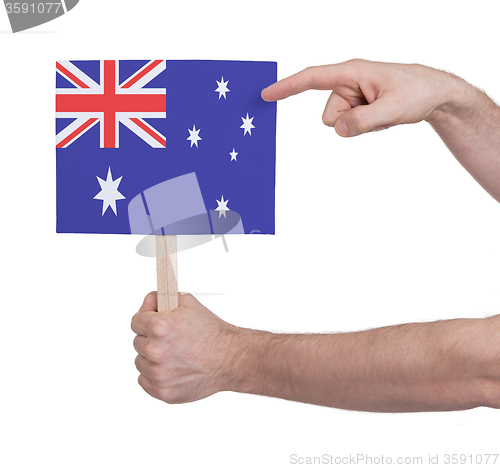 Image of Hand holding small card - Flag of Australia