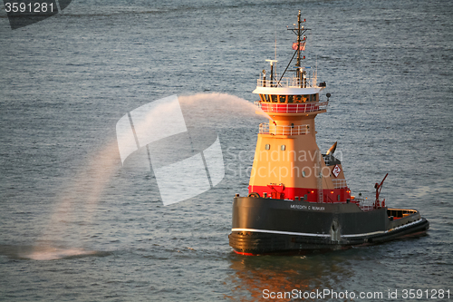 Image of Tugboat spraying water