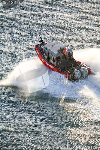 Image of US Coast Guard motorboat sailing