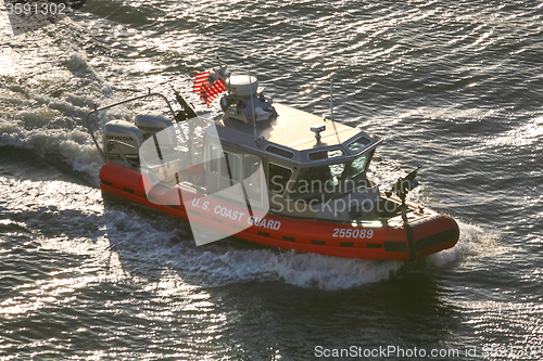 Image of US Coast Guard powerboat sailing