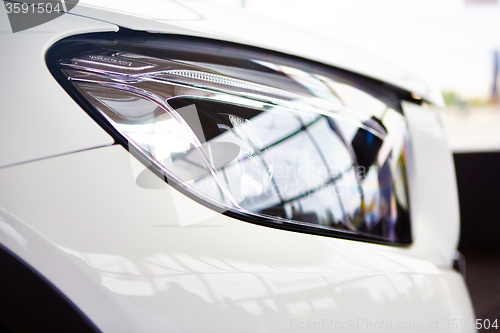 Image of Detail on the headlight of car