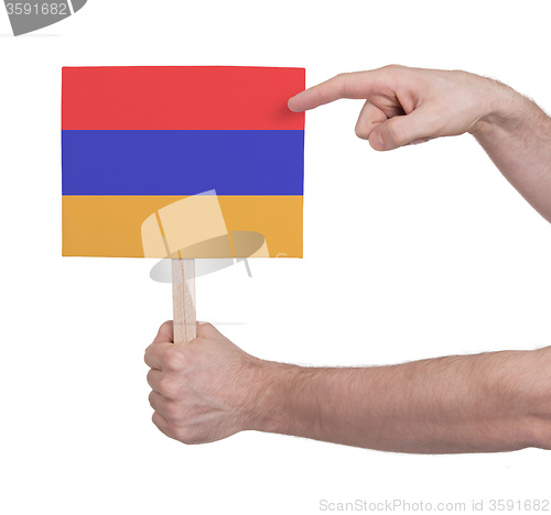 Image of Hand holding small card - Flag of Armenia