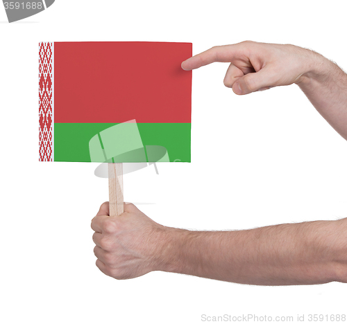 Image of Hand holding small card - Flag of Belarus