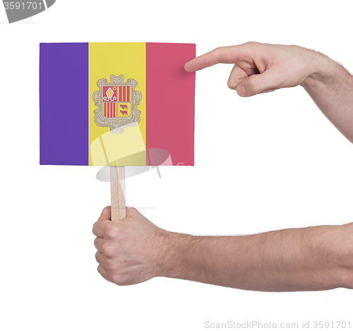 Image of Hand holding small card - Flag of Andorra