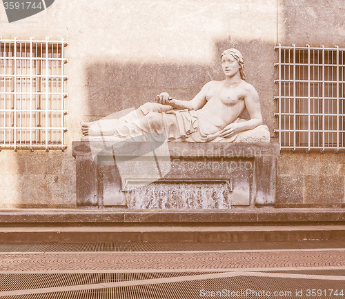 Image of Retro looking Dora Statue Turin