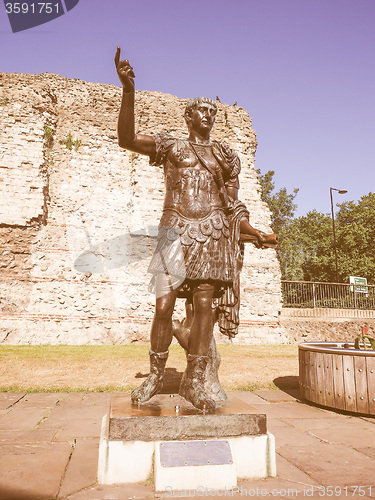 Image of Retro looking Trajan statue in London