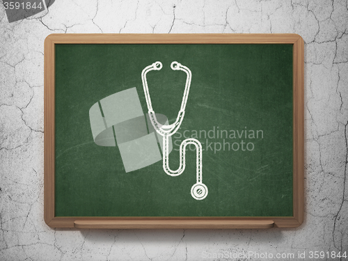 Image of Health concept: Stethoscope on chalkboard background