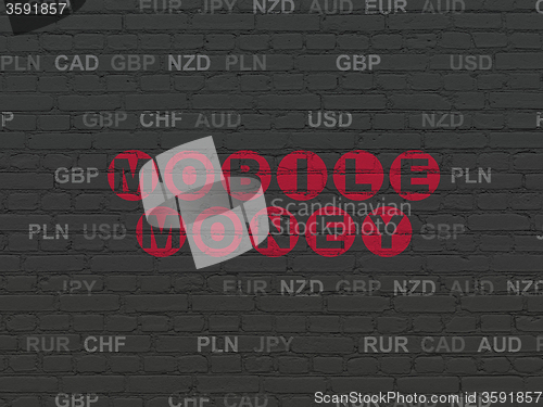 Image of Currency concept: Mobile Money on wall background