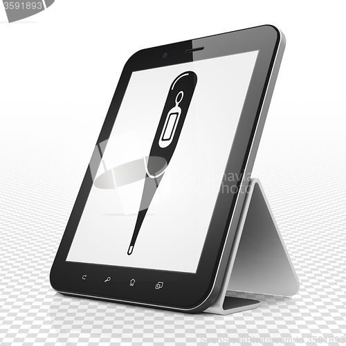 Image of Healthcare concept: Tablet Computer with Thermometer on display
