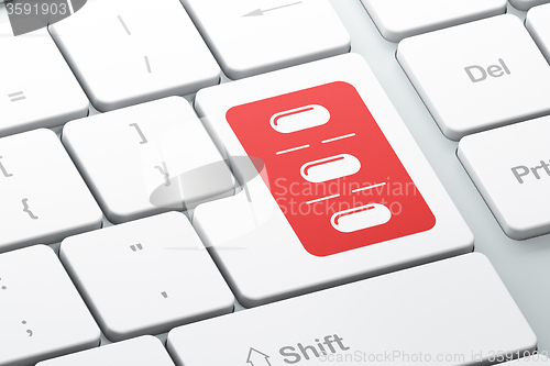 Image of Health concept: Pills Blister on computer keyboard background