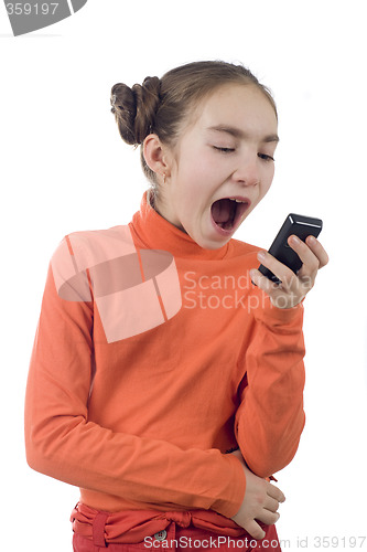 Image of Young girl yelling into cellphone