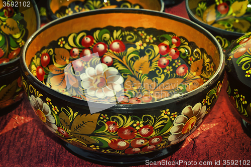 Image of Decorated with beautiful paintings, utensils made of wood.