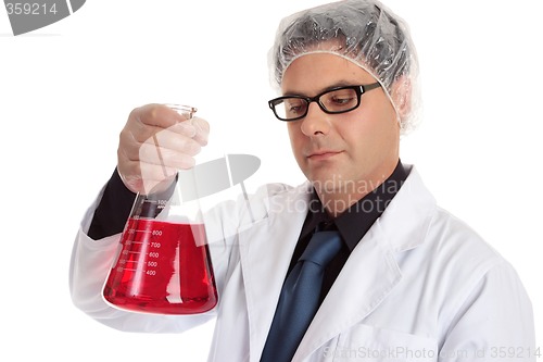 Image of Chemist carrying large flask