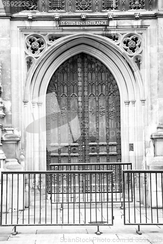 Image of parliament in london old church door and marble antique  wall