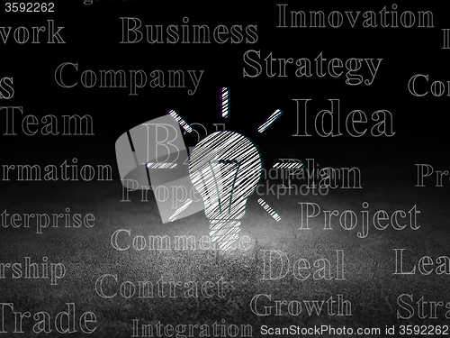Image of Business concept: Light Bulb in grunge dark room