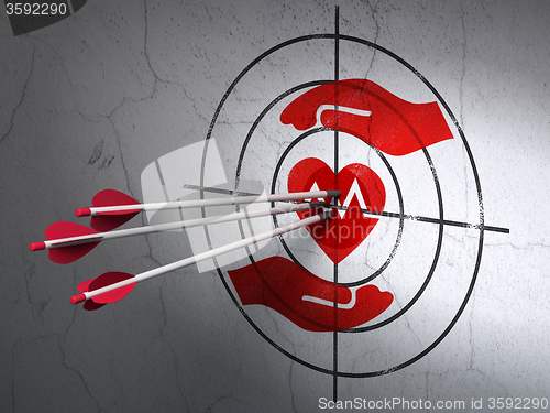 Image of Insurance concept: arrows in Heart And Palm target on wall background